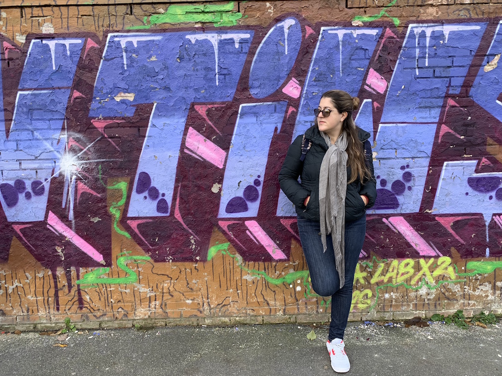 Posing in front of a Copenhagen graffiti wall